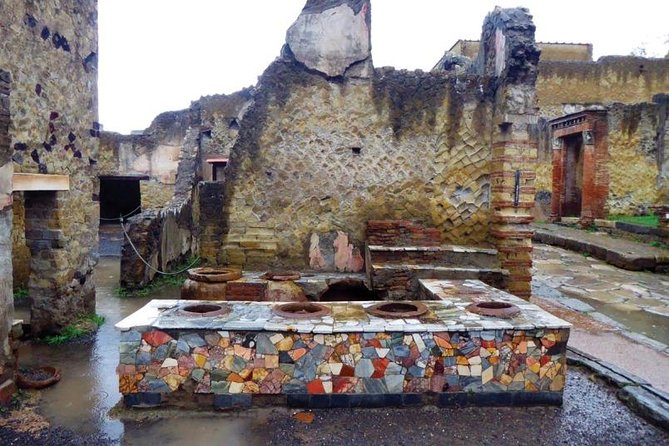 Herculaneum Private Tour with an Expert Archaeologist - The ancient beach and boat sheds with skeletons: powerful, handled with care