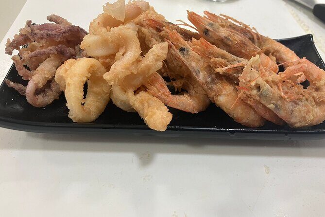 Homemade Pasta And Seafood Cooking Class with Dinner - Language, group size, and what that means for your experience