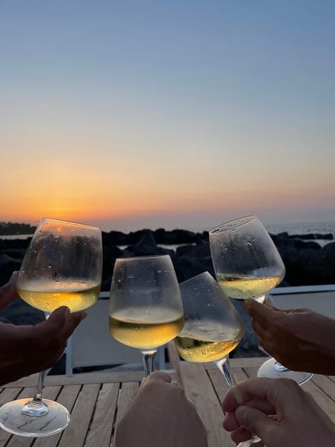 Italian aperitif at the sunset by the sea - The aperitivo moment: bites + a refreshing cocktail