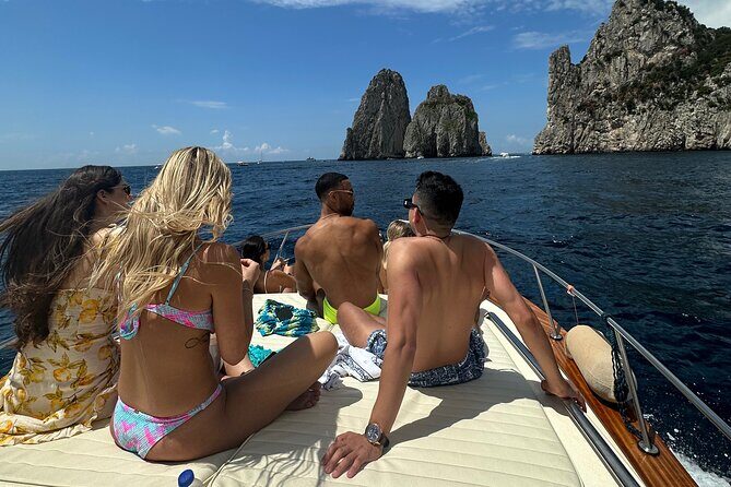 Luxury private boat tour to Capri and Blue Grotto on Gozzo 32 ft - Stop 1: Bay of Naples views (and why timing matters)