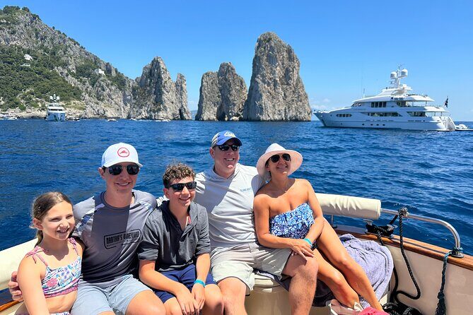 Luxury private boat tour to Capri and Blue Grotto on Gozzo 32 ft - Stop 4: Spiaggia di Marina Piccola, a quieter bay feel
