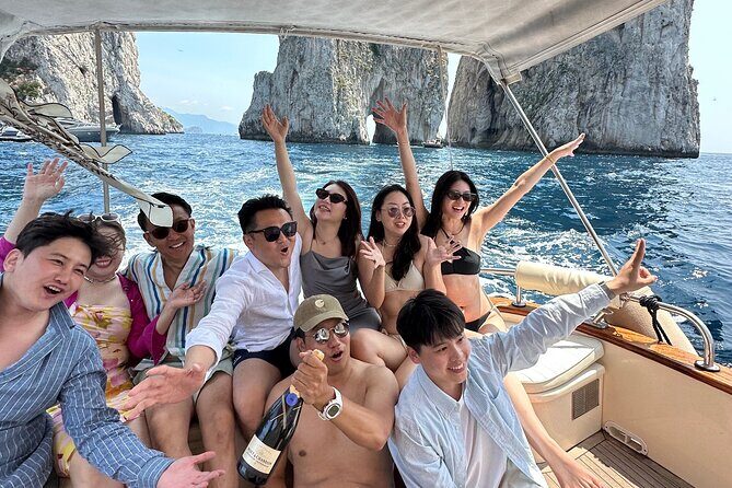 Luxury private boat tour to Capri and Blue Grotto on Gozzo 32 ft - Stop 6: Natural Arch from the sea