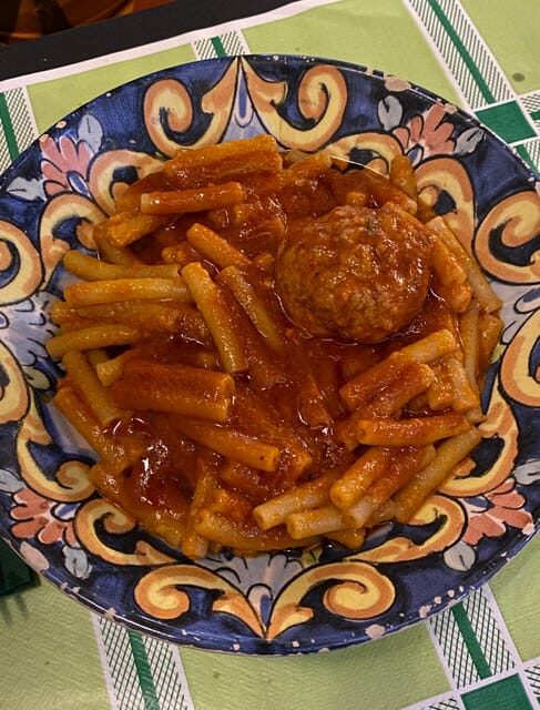 Naples: Authentic Family Home Lunch with Music Show & Spanish Quarters Tour - Live Neapolitan music: songs, atmosphere, and the playful surprises