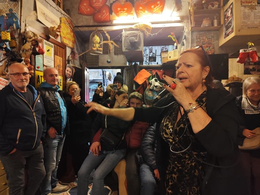 Naples: Authentic Family Home Lunch with Music Show & Spanish Quarters Tour - What the guide actually teaches: femminielli, votive shrines, and the munaciello