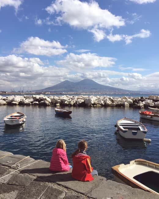 Naples: Evening Sightseeing with Gourmet Dinner - From Molo Beverello to Piazza Bovio: the landmark drive that orients you