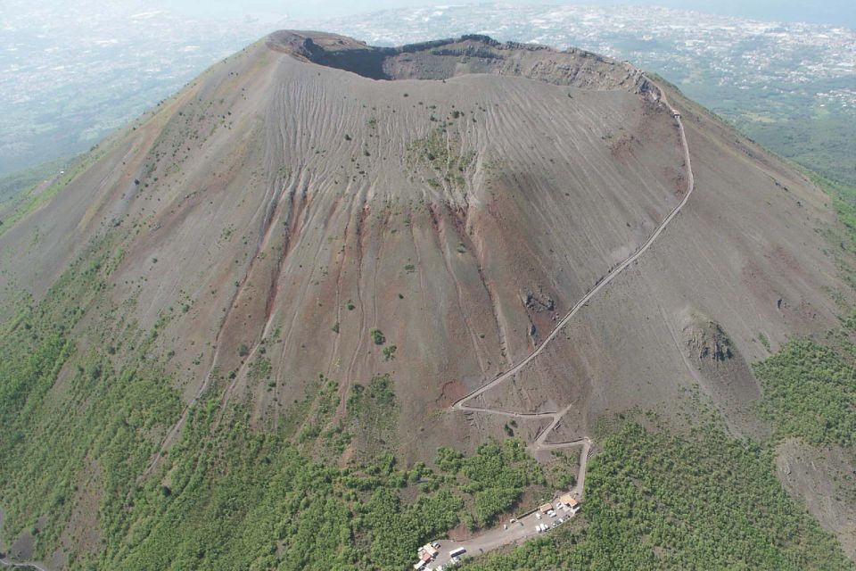 Naples: Pompeii, Herculaneum and Mt. Vesuvius Private Tour - Pompeii ruins: streets, houses, and the big picture