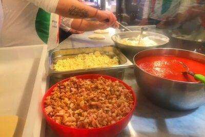 Naples Street Food Tour: Discover Local Flavors with Expert Guide - Via dei Tribunali: Pizza Fritta and the Pulcinella Story