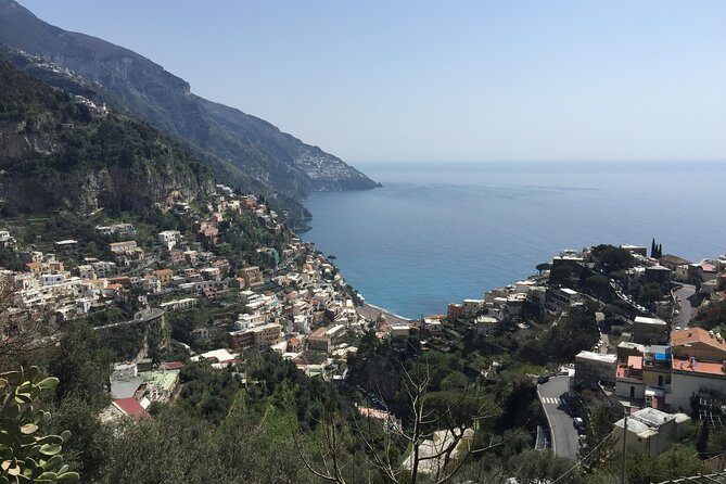 Pompeii- Amalfi Coast tour from Sorrento, with licensed guide included - Positano in one hour: Spiaggia Grande, shopping time, and Church of the Assumption