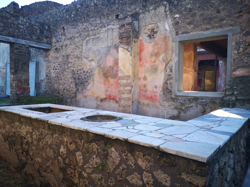 Pompeii: Guided Day Trip to Ruins and 2 Wineries Visits - The 79 AD city walk: what to expect (and what might feel basic)