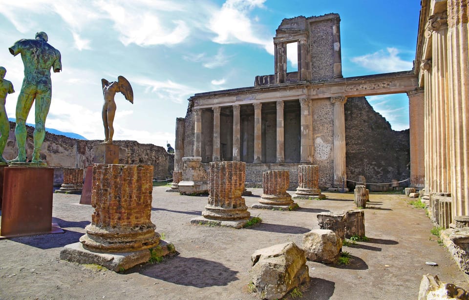 Pompeii: Skip-the-Line Entry & Audioguide - Public life highlights: baths, statues, and entertainment venues