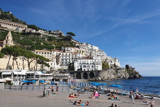 Positano and Amalfi Guided Tour by Sea from Naples - The 20-minute bar picnic stop: quick, useful, and included