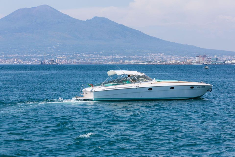 Positano: Boat Tour of Capri with Drinks and Snacks - Boat pace, sea conditions, and route changes that can happen