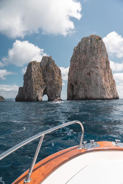 Positano: Capri and Blue Grotto Shared Boat Tour with Drinks - Swim Stop in the Tyrrhenian Sea: Best Time to Bring Your Towel