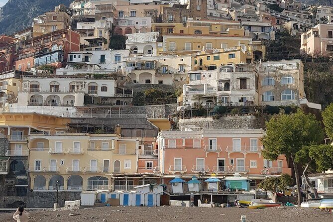 Positano : Private Transfer from Naples visit Pompeii - Pickup and meeting: name placard, lobby meeting, and luggage help