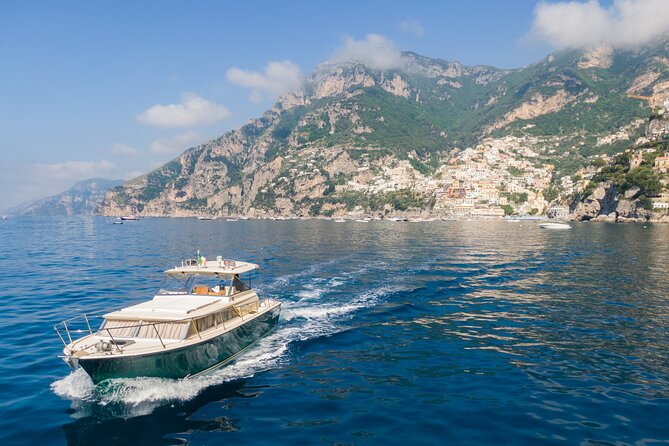 Private boat tour along the Amalfi Coast or Capri from Salerno - Stop 2: an old fishing village with narrow streets and art shops
