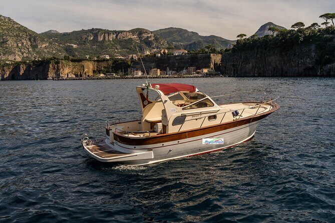 Private Boat Tour from Sorrento to Capri on a Classic Gozzo 8.50 - Punta Carena Lighthouse and Marina Piccola: where the vibe calms down