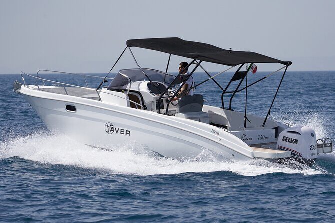 Private Boat Tour with Saver 7.50 WA - I Faraglioni pass under the arch, plus Punta Carena’s lighthouse views