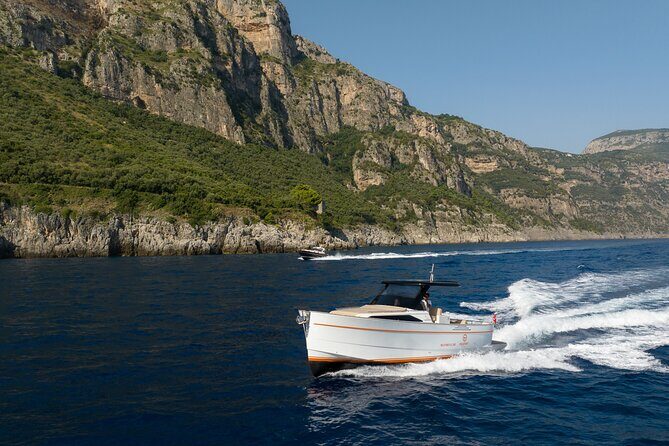 Private Capri Boat Tour in a Luxury Gozzo Apreamare 35ft - The Apreamare 35ft experience: staff, drinks, towels, and snorkeling gear