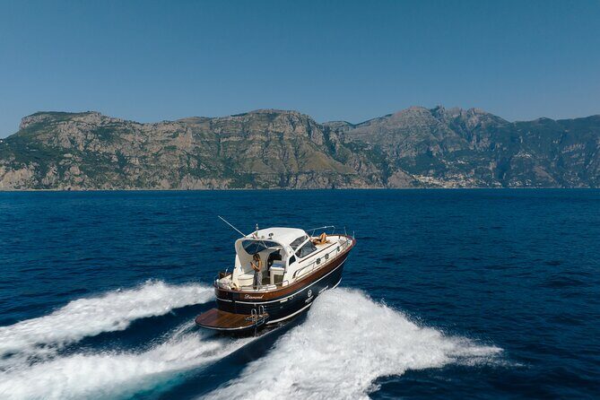 Private Capri Day Tour from Sorrento on a 38ft Motorboat - From Marina Grande to Punta Campanella: coastline views with built-in story stops