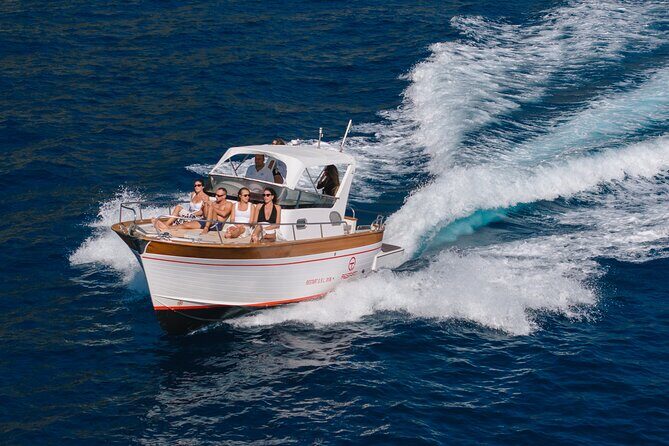 Private Capri Escape: Full-Day Boat Tour from Sorrento - Snorkeling gear, towels, and the onboard food that keeps you happy