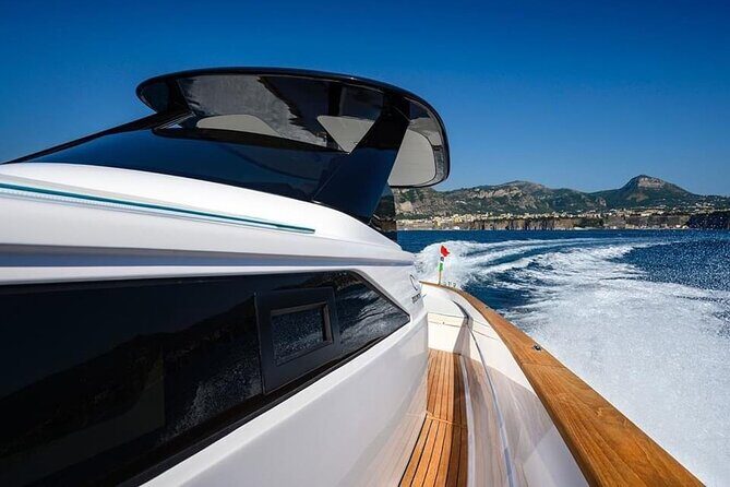 Private Full-day Luxury Boat Tour to Capri from Amalfi Coast - Stop 2: I Faraglioni up close where the rocks own the horizon