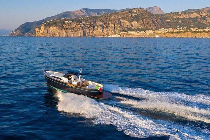 Private Full-day Luxury Boat Tour to Capri from Amalfi Coast - Stop 3: Marina Piccola swim break with a front-row view of yachts
