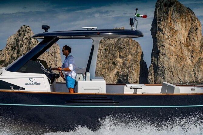 Private Full-day Luxury Boat Tour to Capri from Amalfi Coast - The rest of the day: Amalfi Coast scenery and a tower landmark at the waterline