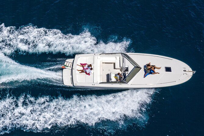 Private Ischia Boat Tour from Positano: Full Day Trip - Approaching Ischia: Aragonese Castle and San Pietro Beach