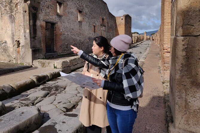 Private Pompeii Tour with Fast-Entrance Tickets to the Ruins & Exclusive Guide - Entering Pompeii from Porta Marina Inferiore