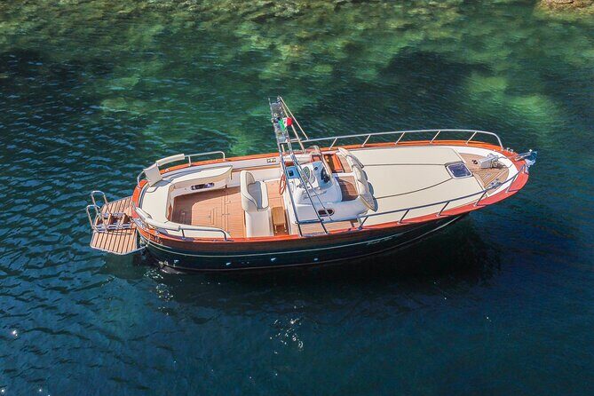 Private tour of the island of Ischia on a Fratelli Aprea gozzo - Meeting point and start time: getting onto the water without drama