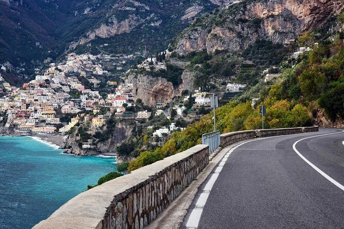 Private Transfer: From Amalfi (hotel) to Naples (hotel-airport-train station) - Booking Ease: Voucher, Mobile Ticket, and Simple Coordination