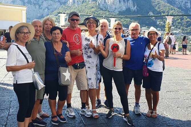 Shared CAPRI Tour - 360° experience by Bus, Boat & Guide - The 1-hour boat ride: caves, Faraglioni, and onboard WC
