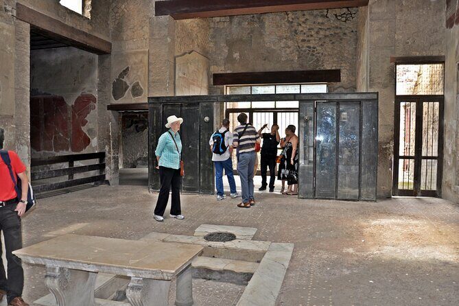 Skip-the-Line Ticket for Herculaneum Ruins - Where you meet and how you redeem at the orange-brick office