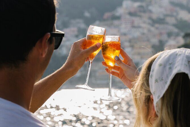 Small Group Tour in Positano by Boat at Sunset with Prosecco - Meeting at Spiaggia Grande: finding Positano Boats fast