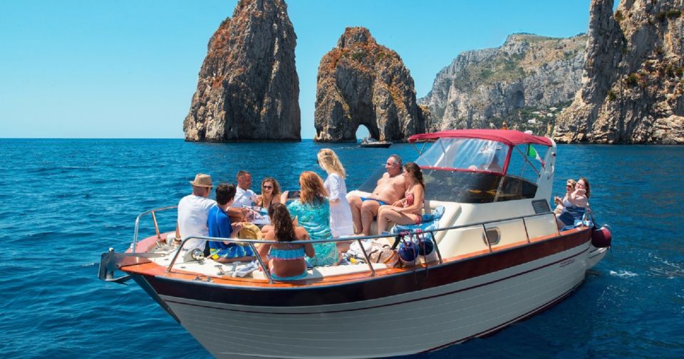 Sorrento: Capri and Blue Grotto Boat Cruise with Drinks - Coastline views: Marina Grande, Roman ruins, and the Mitigliano waterfall