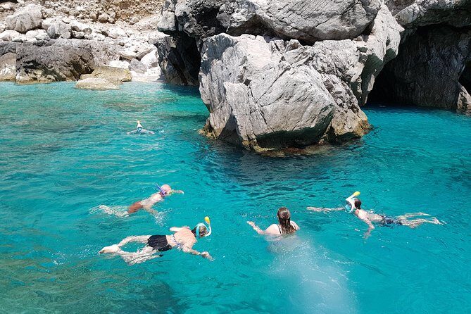 Sorrento: Exclusive Capri Private Boat Tour & Blue Grotto - The Blue Grotto on a wood boat: the main-ticket moment