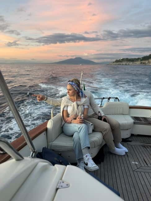 Sorrento: Sunset Coastal Boat Tour with Aperitif - On-board perks: Prosecco aperitif, limoncello, showers, and shade