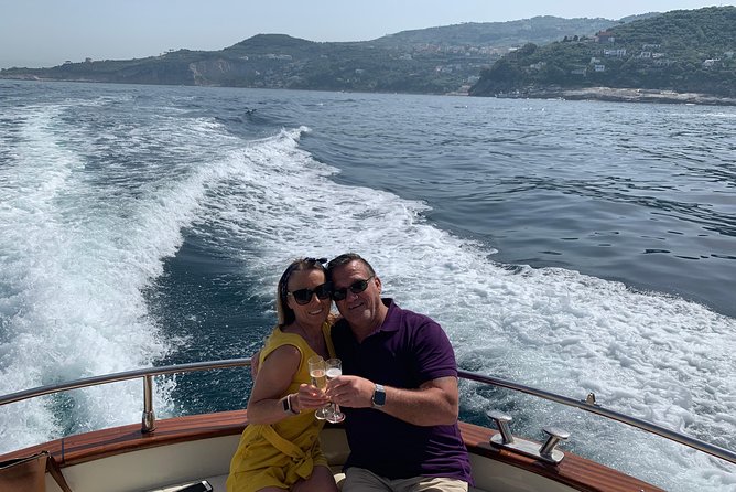 Sunset boat experience in Sorrento coast - Massa Lubrense waterfall stop: the quick shower moment