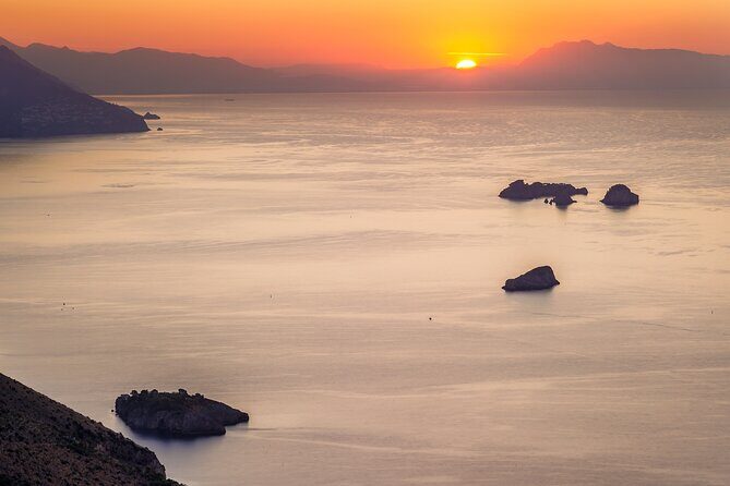 Sunset boat tour of the Amalfi Coast - Stop 1: Il Duoglio Spiaggia, Sant’Andrea cave, and the Arch of Love