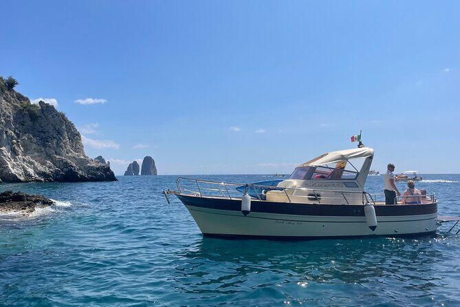Three Hour Private Guided Tour of Capri with a luxury Gozzo cabin cruiser - I Faraglioni: The Iconic Rocks and the Best Angles