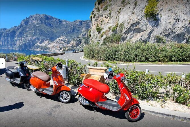 Vespa Rental to Discover Sorrento, Amalfi Coast, Positano & More - The Positano pit stop: park, wander, then hit the beach view
